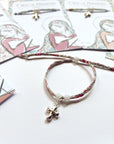 Pulsera Cruz de Primavera (rosa)